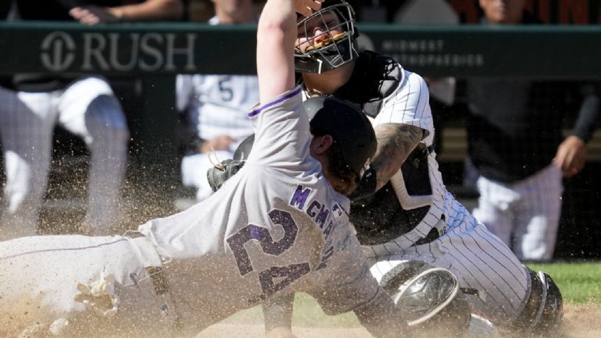 Toglia hits a sacrifice fly in the 14th inning as the Rockies top the White Sox 5-4