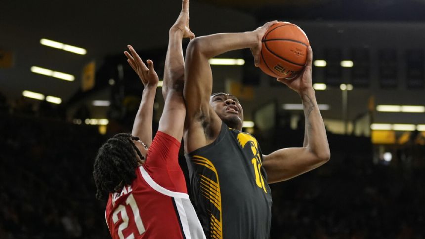 Tony Perkins's 20 points help Iowa hold off Ohio State, 79-77