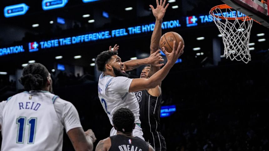 Towns scores 27 points, Edwards gets 24, Timberwolves hang on for 96-94 win over Nets