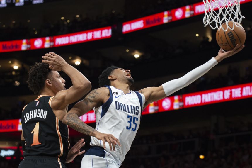 Trae Young lifts Hawks past Mavericks in OT, 132-130