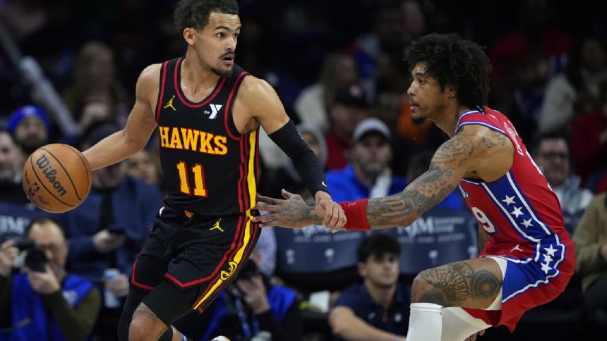 Trae Young scores 37 as Hawks end 2-game skid with 127-121 win over short-handed 76ers
