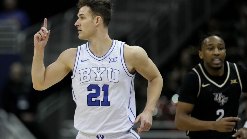 Traore inside, Saunders outside lead No. 20 BYU to 87-73 win over UCF in Big 12 Tournament