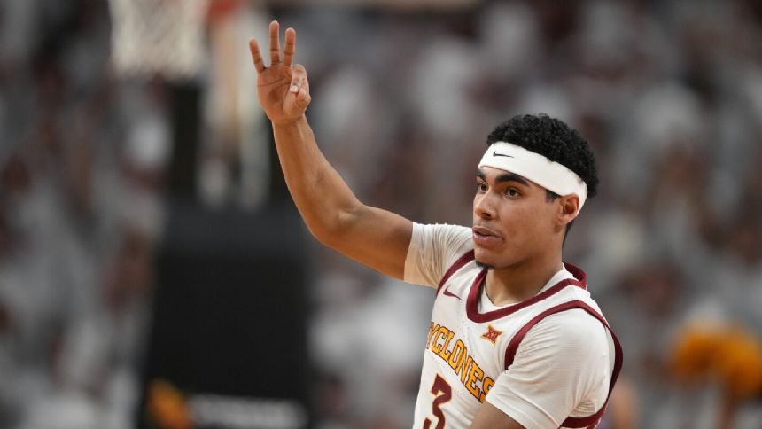 Tre King helps No. 23 Iowa State top No. 7 Kansas 79-75