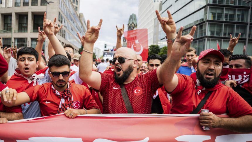 Turkey supporters make controversial hand gesture on way to stadium for Euro 2024 match