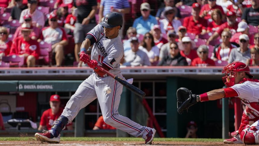 Twins overcome Hunter Greene's 14 Ks, rally to beat Reds 5-3 and drop AL Central magic number to 2