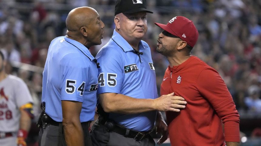 Umpires Jeff Nelson, Ed Hickox retire, are replaced on big league staff by Ryan Wills, Clint Vondrak
