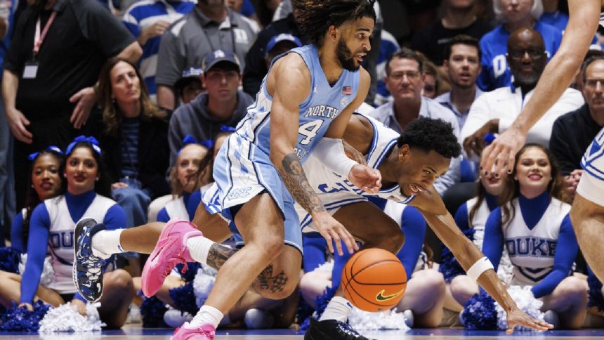 UNC's RJ Davis and Hubert Davis honored as ACC's top player, coach