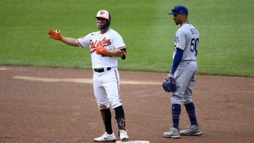 Urias has 3 RBIs for Orioles, who beat Dodgers 8-5 and avoid first series sweep in 14 months