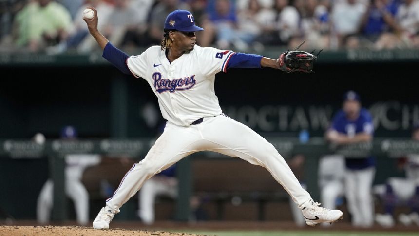 Urena's perfect-game bid ends with homer but Rangers top Detroit 9-1 to avoid a sweep