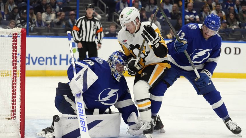 Vasilevskiy has 23 saves, Kucherov has a goal and assist as Lightning beat Penguins 3-1