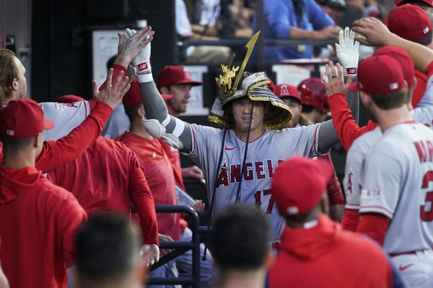 Vaughn drives in 3, Gonzalez homers to help White Sox beat Angels 7-3