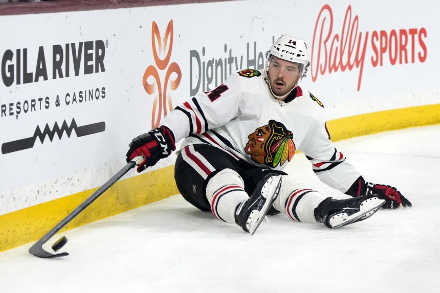 Vejmelka, Coyotes beat Blackhawks 4-1 after Kane trade