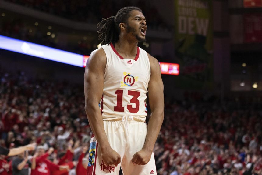 Walker scores 23, Nebraska beats Maryland 70-66 in OT