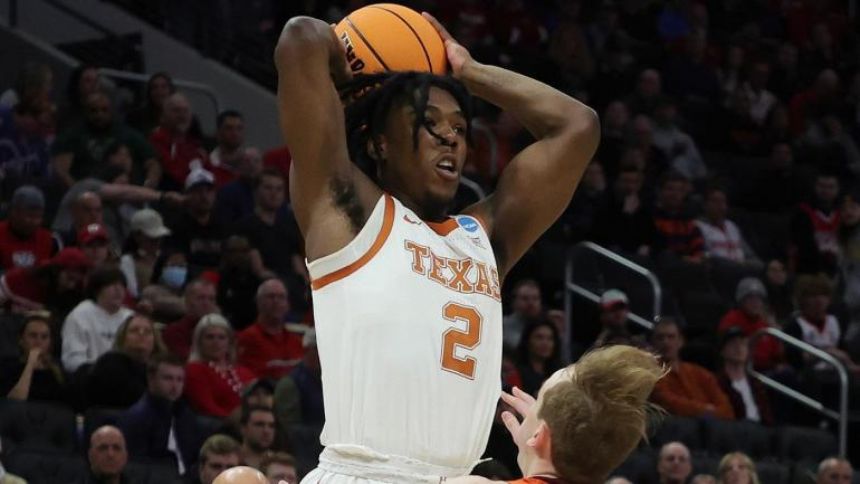 WATCH: Texas hits half-court buzzer-beater vs. Virginia Tech to take lead into halftime in first round matchup