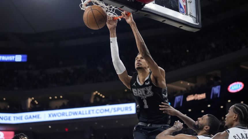 Wembanyama's 33 points, 16 rebounds power the Spurs past Nets 122-115 in overtime