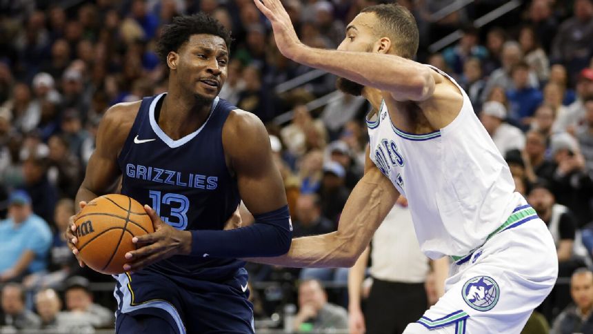 West-leading Timberwolves beat Grizzlies 118-103 to reach midpoint with 30-11 record