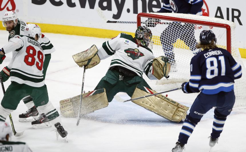 Wild beat Jets 4-2, move into tie with Stars atop Central