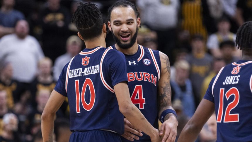 Williams scores 17 to help No. 13 Auburn beat Missouri 101-74, dropping Tigers to 0-17 in SEC