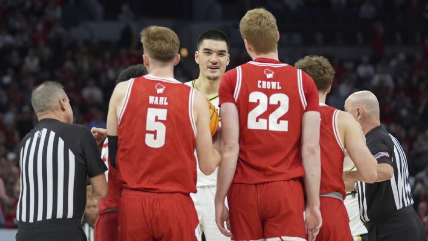Wisconsin battles to 76-75 OT win over No. 3 Purdue, securing spot in Big Ten championship game