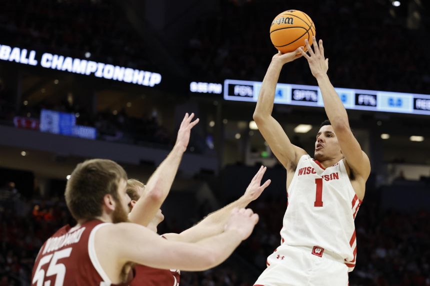 Wisconsin outlasts Colgate 67-60 as Davis leads comeback