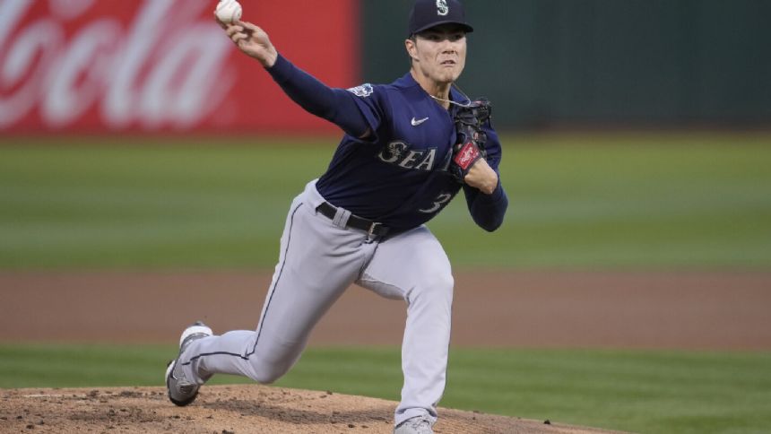 Woo wins homecoming as Mariners blank A's 5-0 to move closer in AL West and tie for final wild card