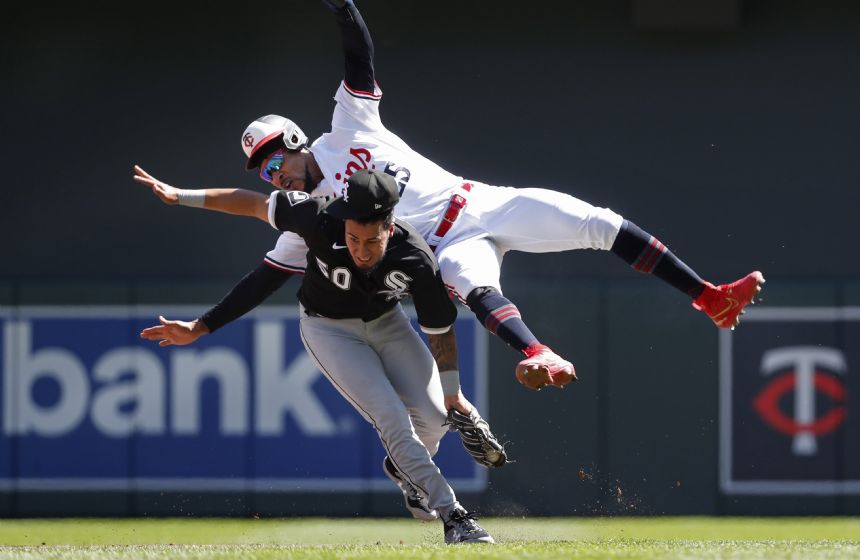 Twins outlast Brewers, rain in 6-4 win