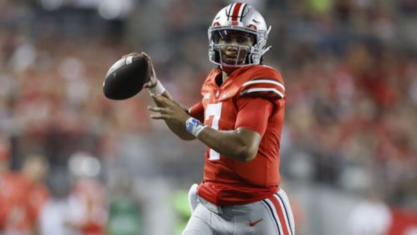 No. 3 Buckeyes score early and often, bury Wisconsin 52-21